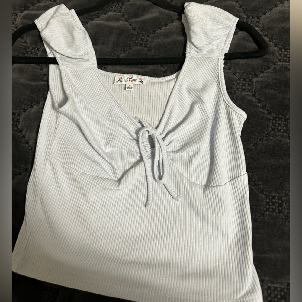 Baby blue blouse in new condition hasn’t been used perfect condition